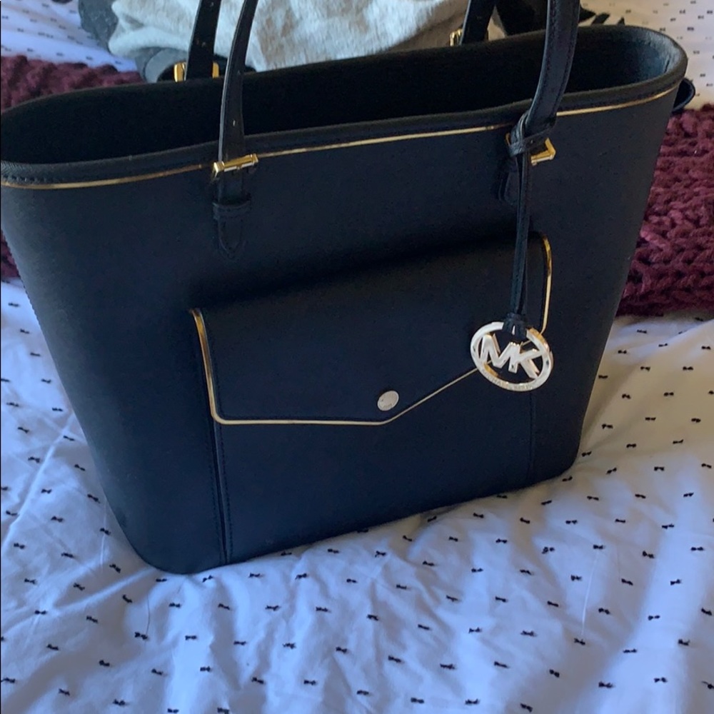 Black Michael kors bag with gold trim